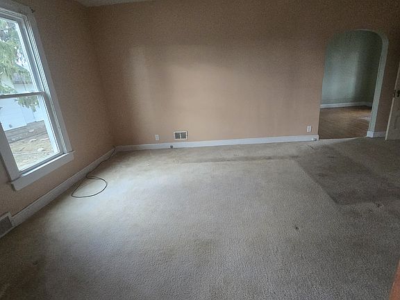 Living room view from sun porch (prior to carpet cleaning)