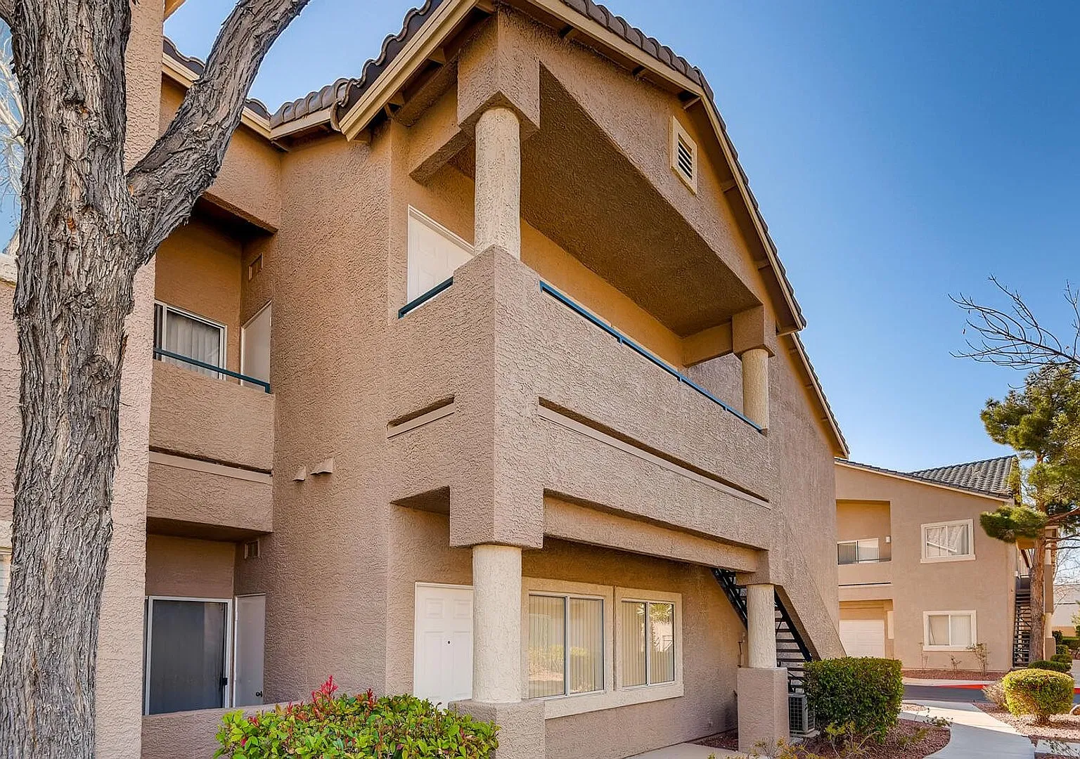 Gated Southwest Condo with 2-Car Garage & Community Pool — Photo 1