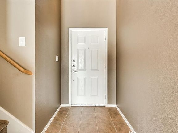 Light and bright 2-story entry...