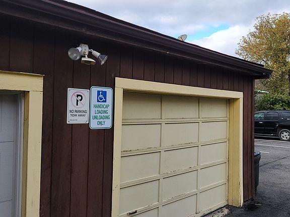 Right Garage for single car included with 313 Church Street Suite 1. It has a remote opener.