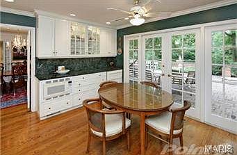 Breakfast nook in Kitchen with French doors to terrace.