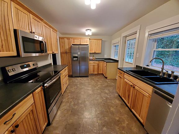 Brand new appliances, lighting, new paint and trim throughout house