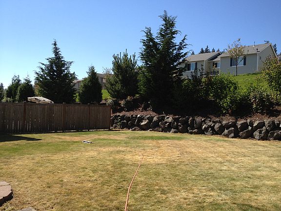 Rockwall & huge backyard