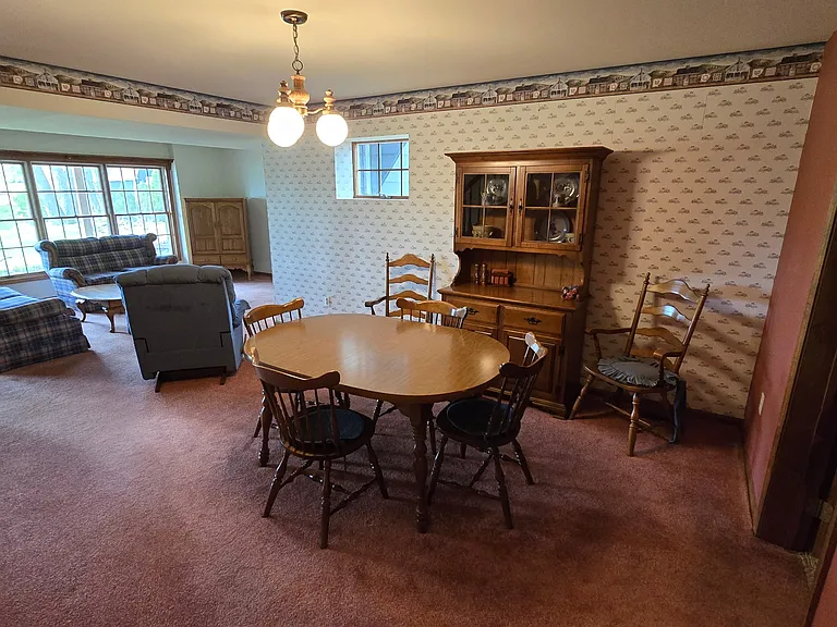 Basement dining/living room with gas fireplace