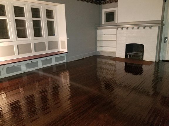Enjoy your family time in your newly painted and polished floors Living Room