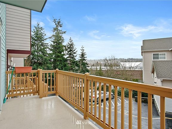 Spacious front deck with views of downtown Redmond