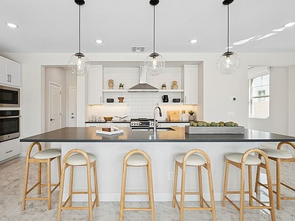 Kitchen with pendant lighting and spacious island