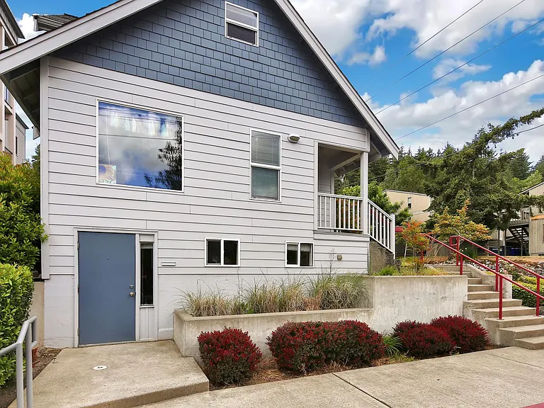 The studio is located on the ground floor of a house and shares a washer and dryer with the tenants upstairs.