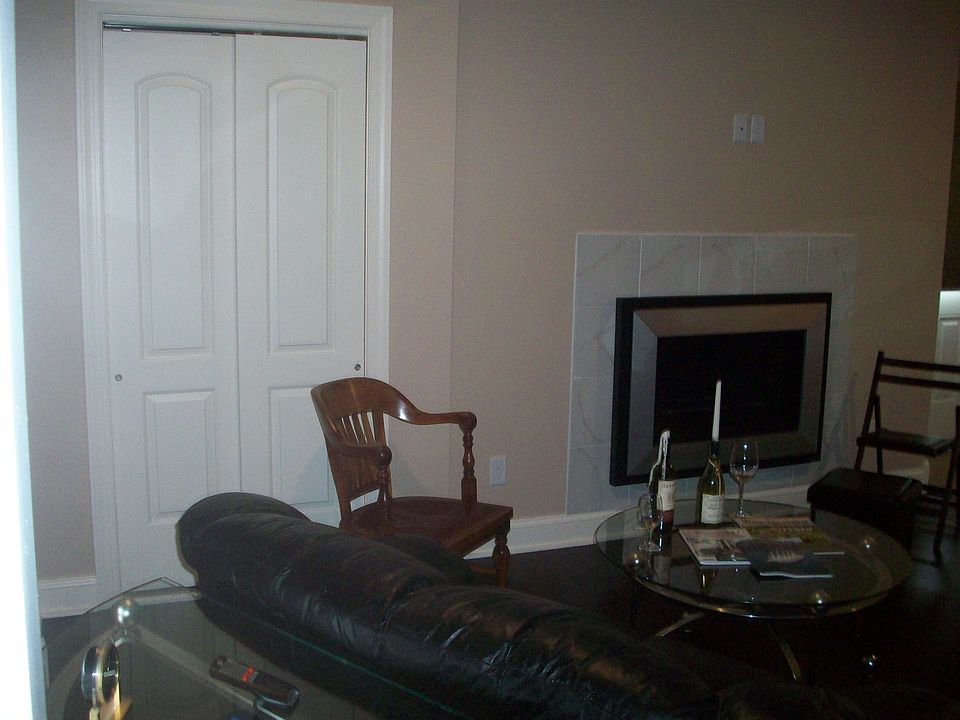 gas fireplace in living room with 9 foot ceilings Also set u