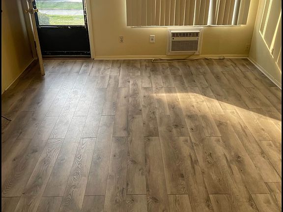 New wooded flooring. Freshly painted.