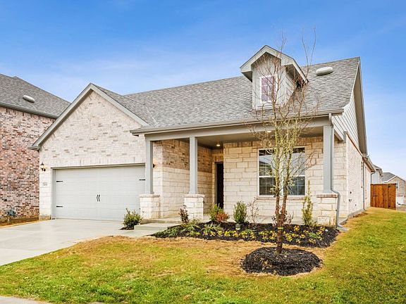 The Emory, a one-story home with 2-car garage, shown with Home Exterior 37