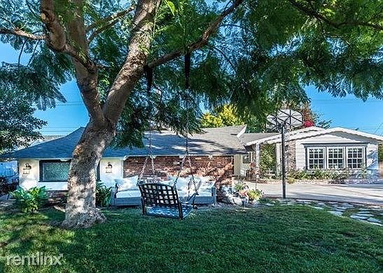 Large tree lined yard, house set back off the street