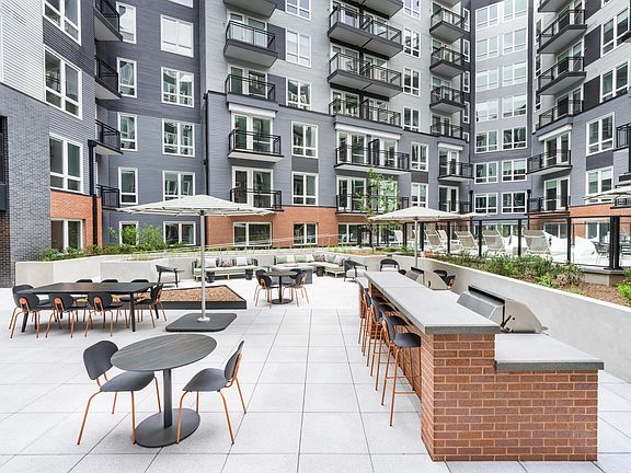 Gather with friends or unwind solo in our expansive courtyard, featuring grilling stations, shaded dining areas, and plenty of space to relax.