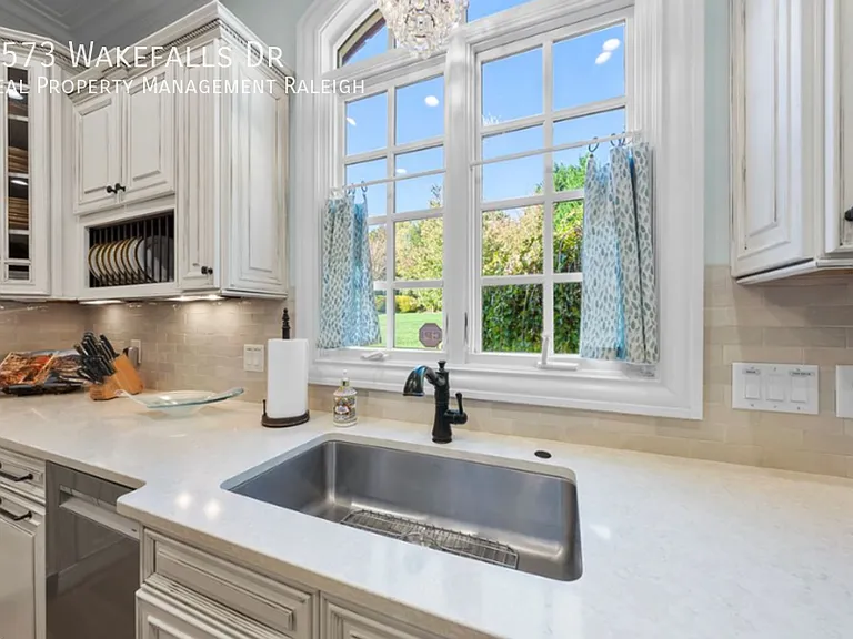 6573 Wakefalls Dr — Photo 37
