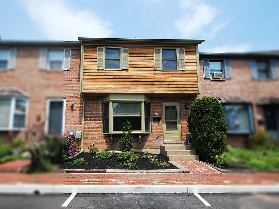 Front view of unit with available parking spots