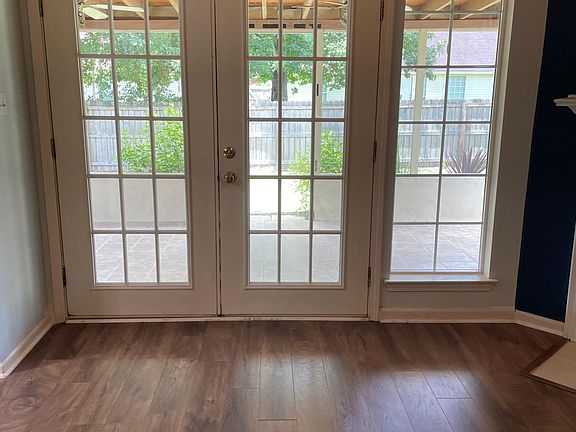 Spacious Living Room with view tp private backyard. All rooms are freshly painted.