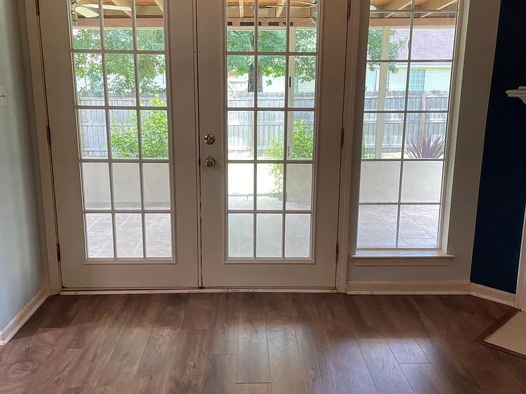 Spacious Living Room with view tp private backyard. All rooms are freshly painted.