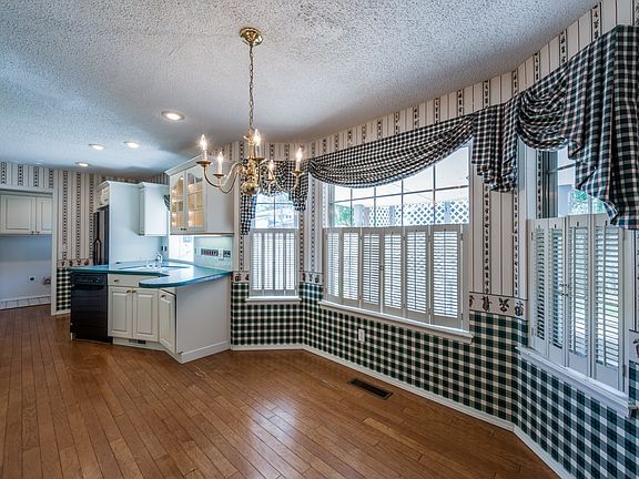 kitchen has wood floor
