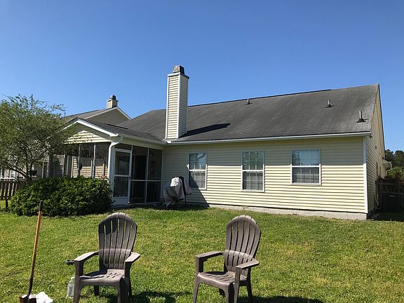 Back Yard Showing Screened Porch