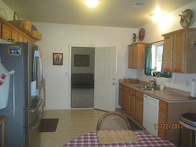 Kitchen leads to family room