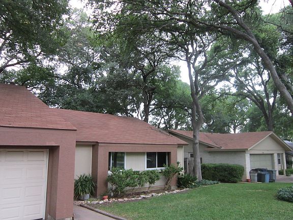 Treed view of front and neighbor