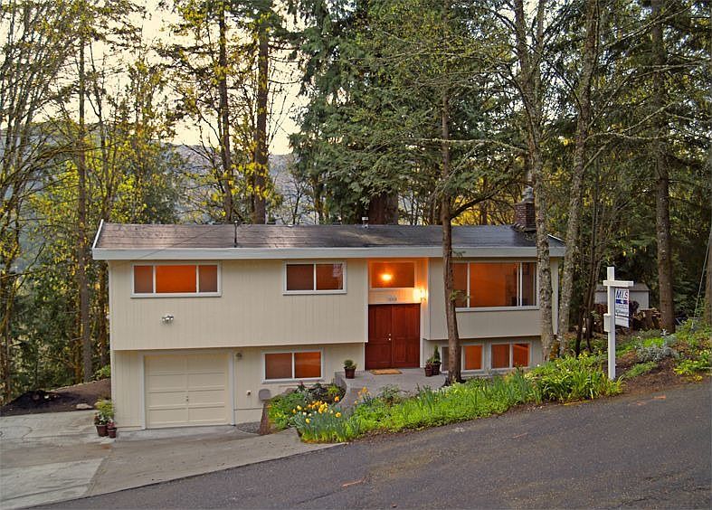 Front of home, greenbelt and creek in background