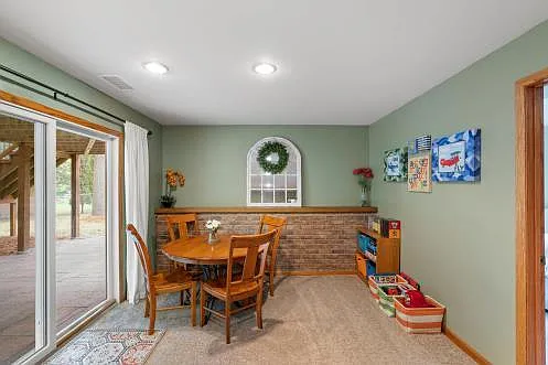 lower playroom, family room area, with walkout to patio