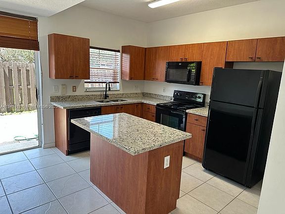 5th image of 6016 NW 116th Pl APT 408