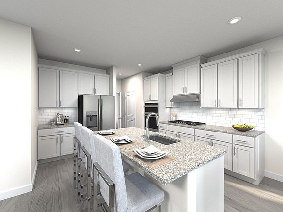 The Ayden s spacious kitchen offers ample counter space and large island.