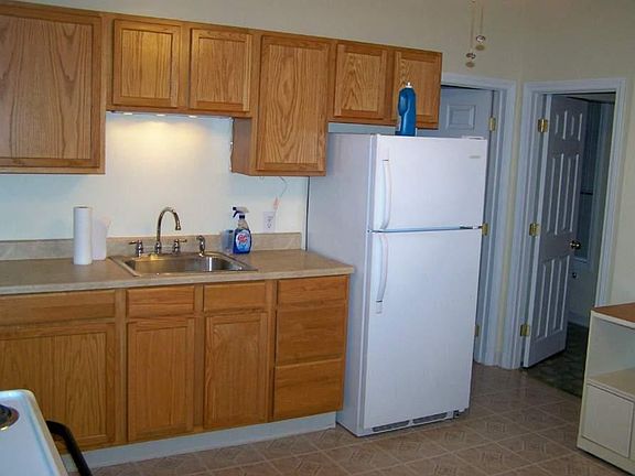 Kitchen w/ Bdrm 2 door and bathroom door
