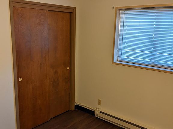 Spare bedroom with closet.