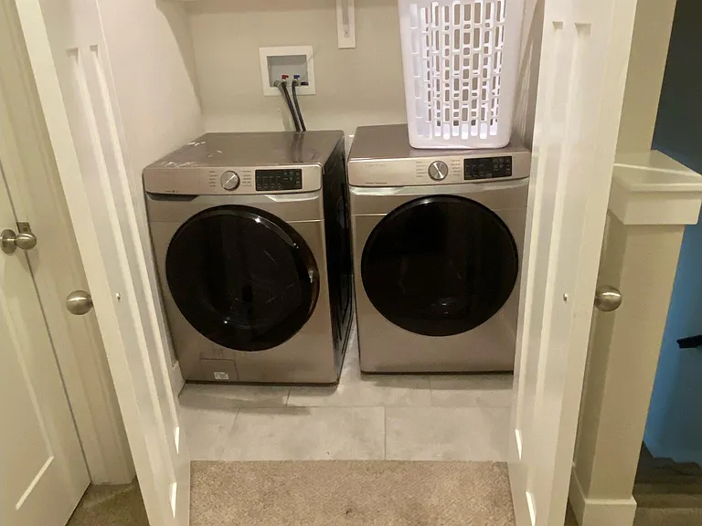 In Unit washer dryer with storage space