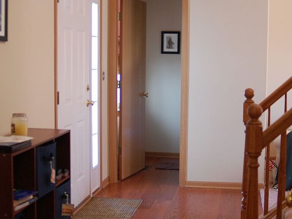 Airy foyer with half bath.  New flooring!!