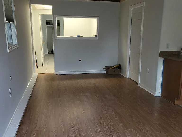 As you enter the living room.