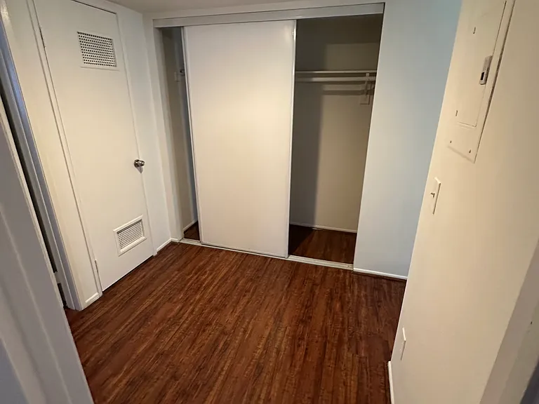 Common Hallway with Large Closet space and the Water Heater