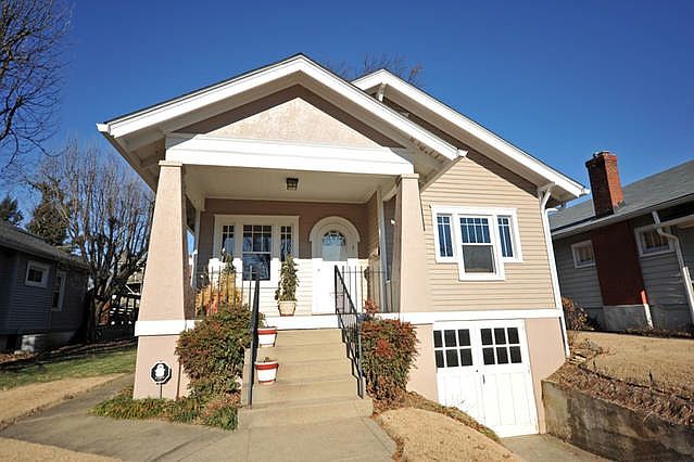 Fully renovated 1929 bungalow with a drive-in garage in the