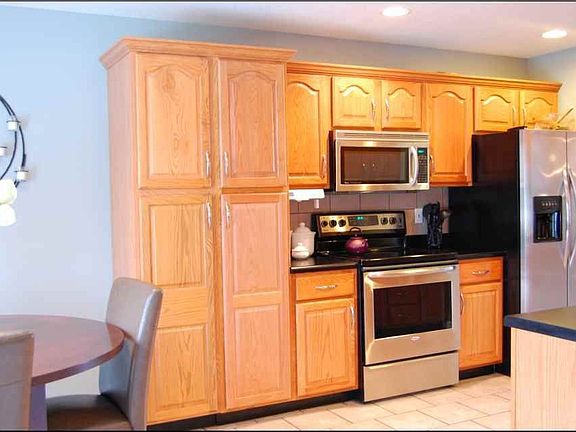 Kitchen w/ stainless steel appliances