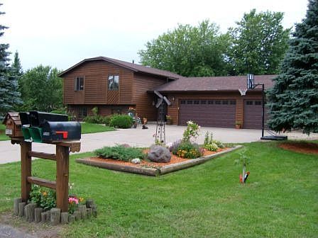 4BR home, huge 3 car garage on 1.25 acre lot.