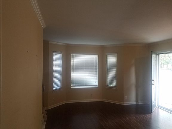 Front living room with plenty of light.