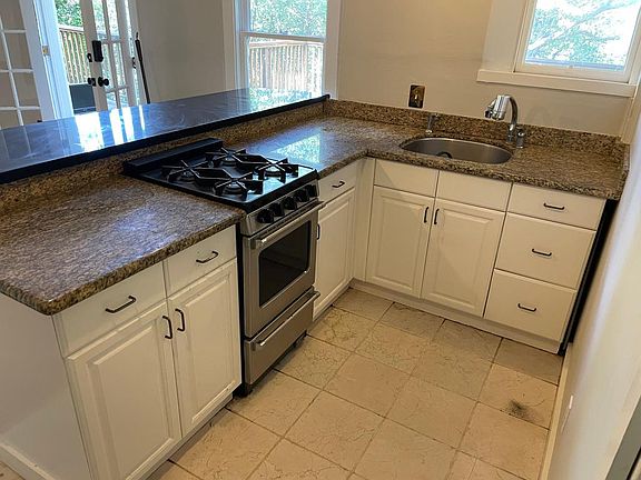 Built in stove, garbage disposal