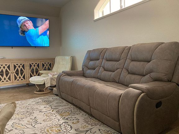 65" TV, reclining sofa and loveseat on first floor, also many board games to play.