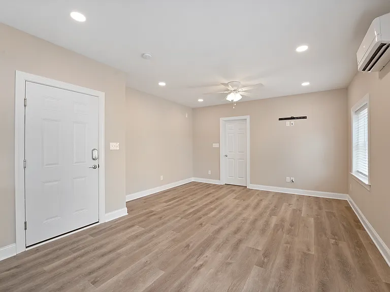 Large living room seating area with LED lighting