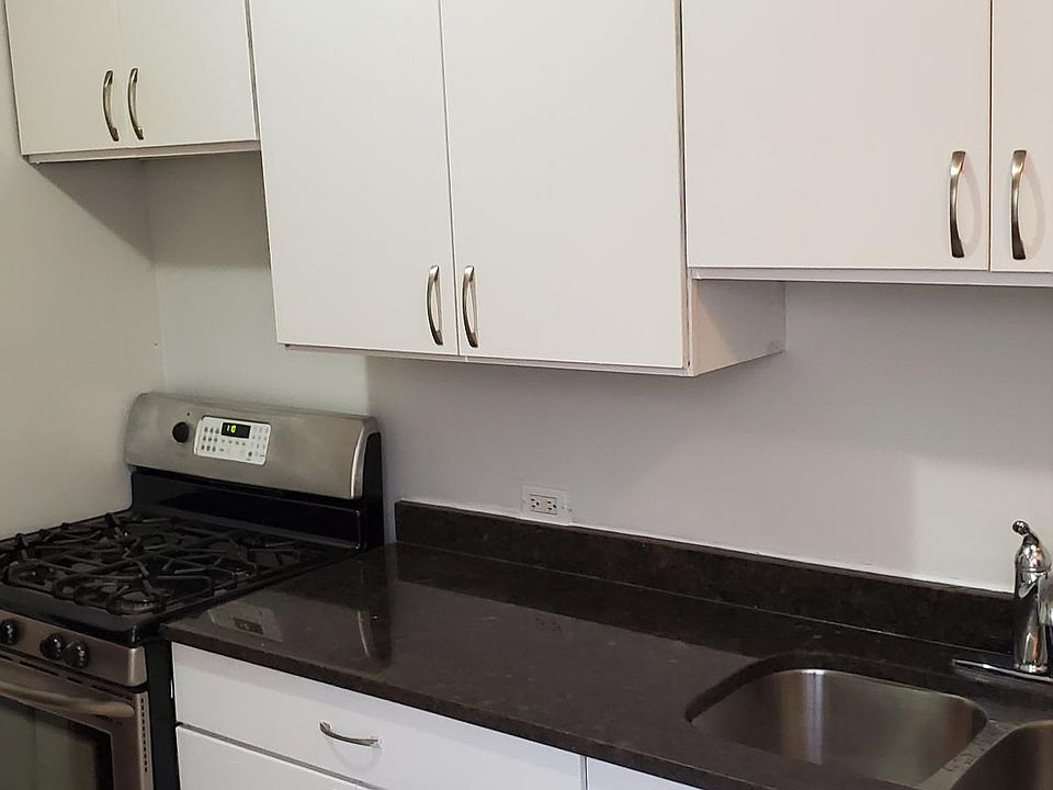 Kitchen with stainless steel appliances and granite counter top