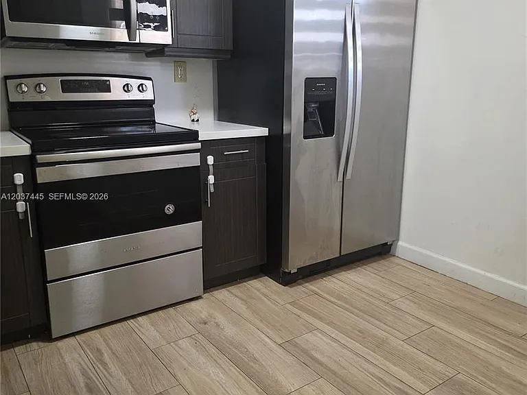 15711 SW 137th Ave #101 — Photo 3