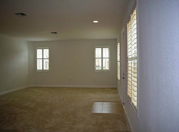 Spacious living room with lots of natural light & Dramatic 1