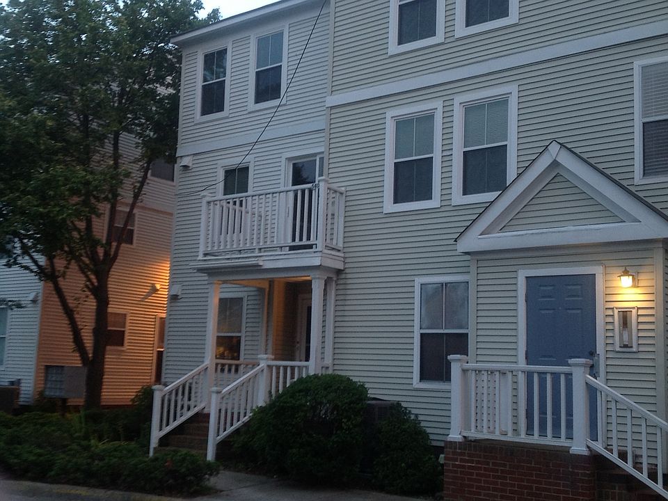 Exterior Rear looking toward balcony