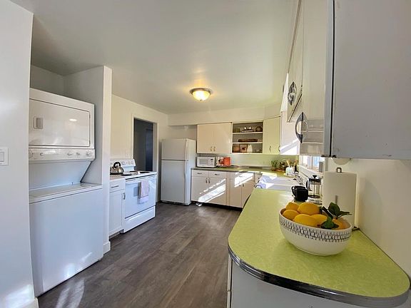 Stackable washer and dryer. Plenty of storage.