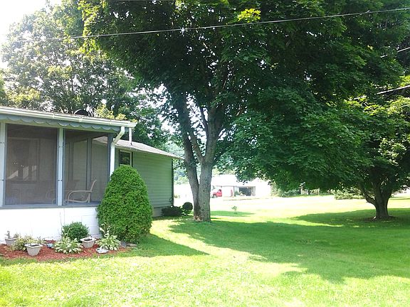 Screened patio and side yard