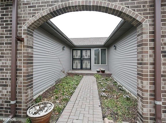 Private entrance enhanced with perennials!