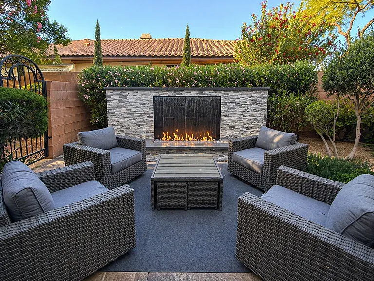 Private outdoor lounge with 12 foot wide water/fire feature